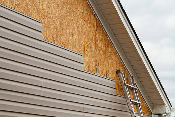 Professional Vinyl Siding technician working in Newtown, OH